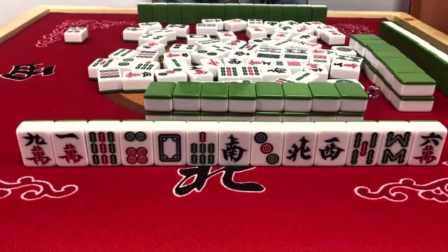 麻将:小伙一手烂牌,全凭手气打成了十三幺的牌,实属不易啊!