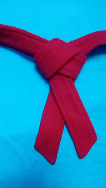 女士大衣腰带结的系法