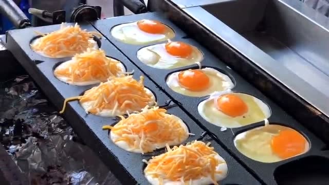 超好吃的街头鸡蛋糕,看着就很有食欲啊,吃货的世界就是这么简单