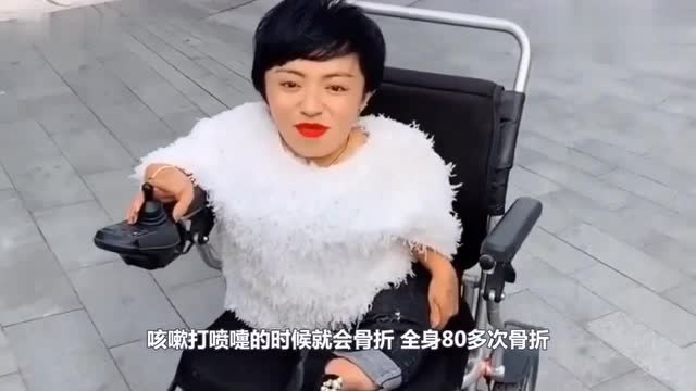轮椅上创业女人李喜梅,身高只有80厘米