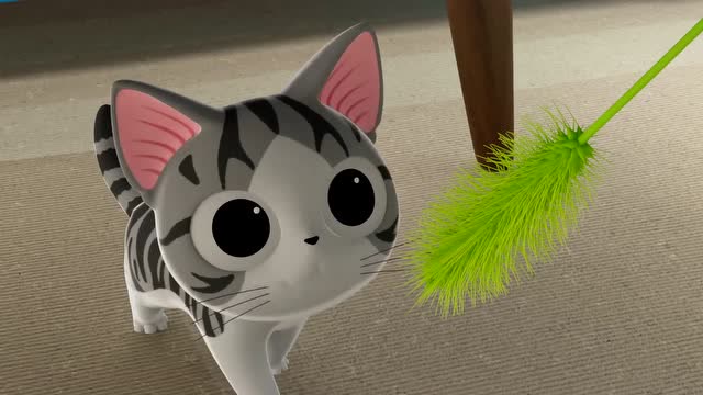 甜甜私房猫:小奇奇对这个毛茸茸的东西很好奇呢