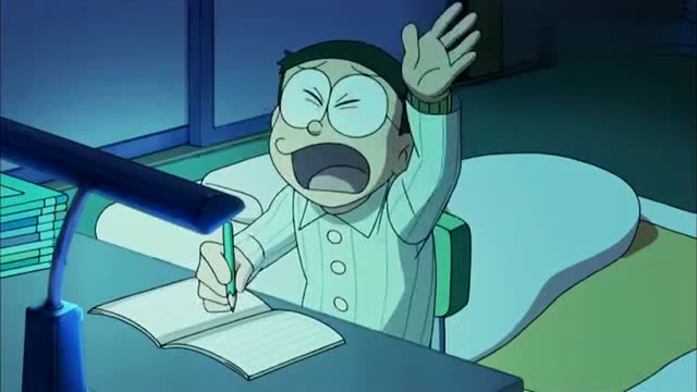 大雄设置错了道具的时间,只好在三更半夜起来读书了