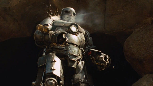 钢铁侠身穿第一代战甲,站着让对方打,等对方子弹打完他再动手