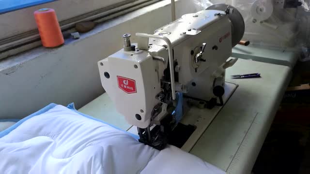 千业棉被棉胎包切一体机