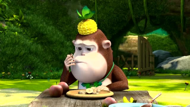 熊熊乐园:吉吉把香蕉切成小块,小口小口的吃东西,像个真正的王子