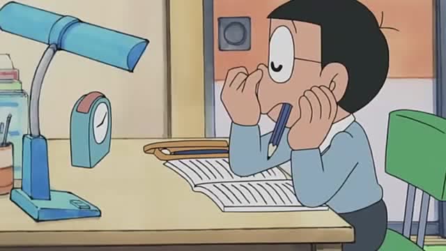 哆啦a梦:爸爸看到大雄坐在书桌前假装学习的样子气得忍不住吼他