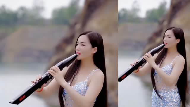 电吹管版女歌手吹奏一曲一壶老酒感人的旋律直入心扉