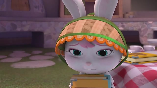 小兔子凯特拿着一本书干什么呢