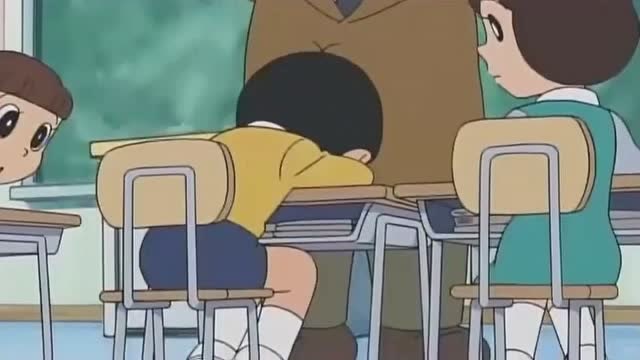 哆啦a梦大雄在课堂上睡觉受到了老师的表扬真是怪了