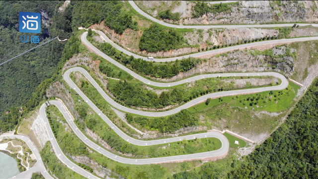 航拍四川宣汉盘山公路,十八道弯如巨龙盘绕山间