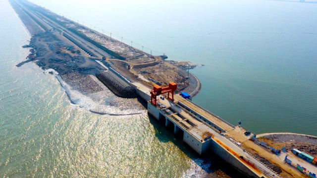 中国"最大规模"的填海工程,耗资600亿,挖空2座大山造海上城市