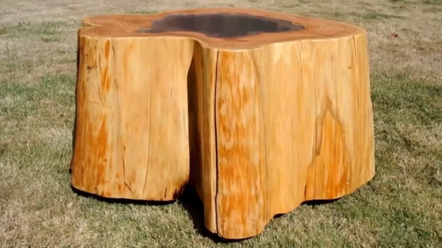 一个中间烂掉的树墩,被木匠做成了这件艺术品,果然是大师!