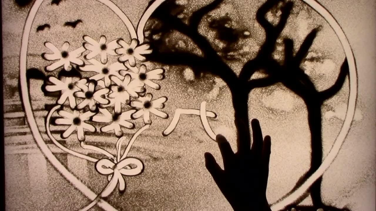 沙画作品感恩的心
