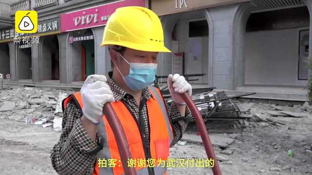 武汉江汉路步行街地面整改:全线封闭施工三个月,街道冷清