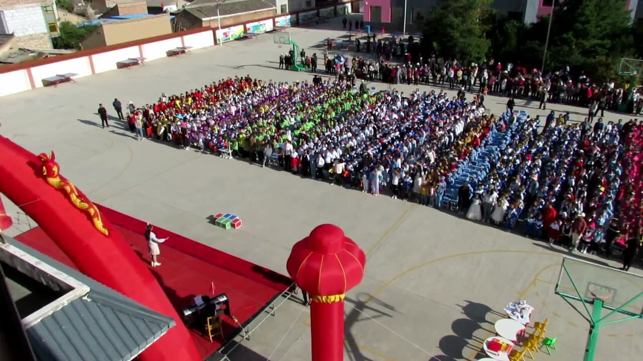 岷县岷阳镇东关小学校歌资料《童心飞扬》