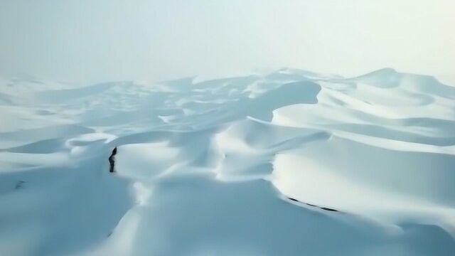 美哭了!新疆鄯善县降40年不遇大雪,雪覆盖在沙浪上犹如一片雪海