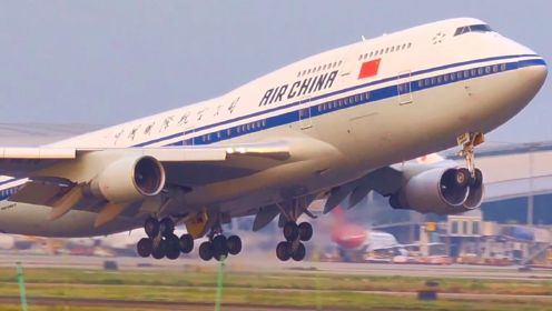 广州白云机场两架国航波音747同框，一架降落一架起飞，太壮观了