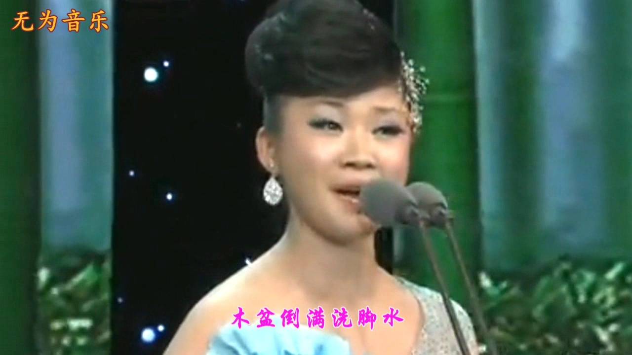 歌手李君演唱的《吊脚楼上等哥回》妹妹等哥心焦急哥哥不知何时归