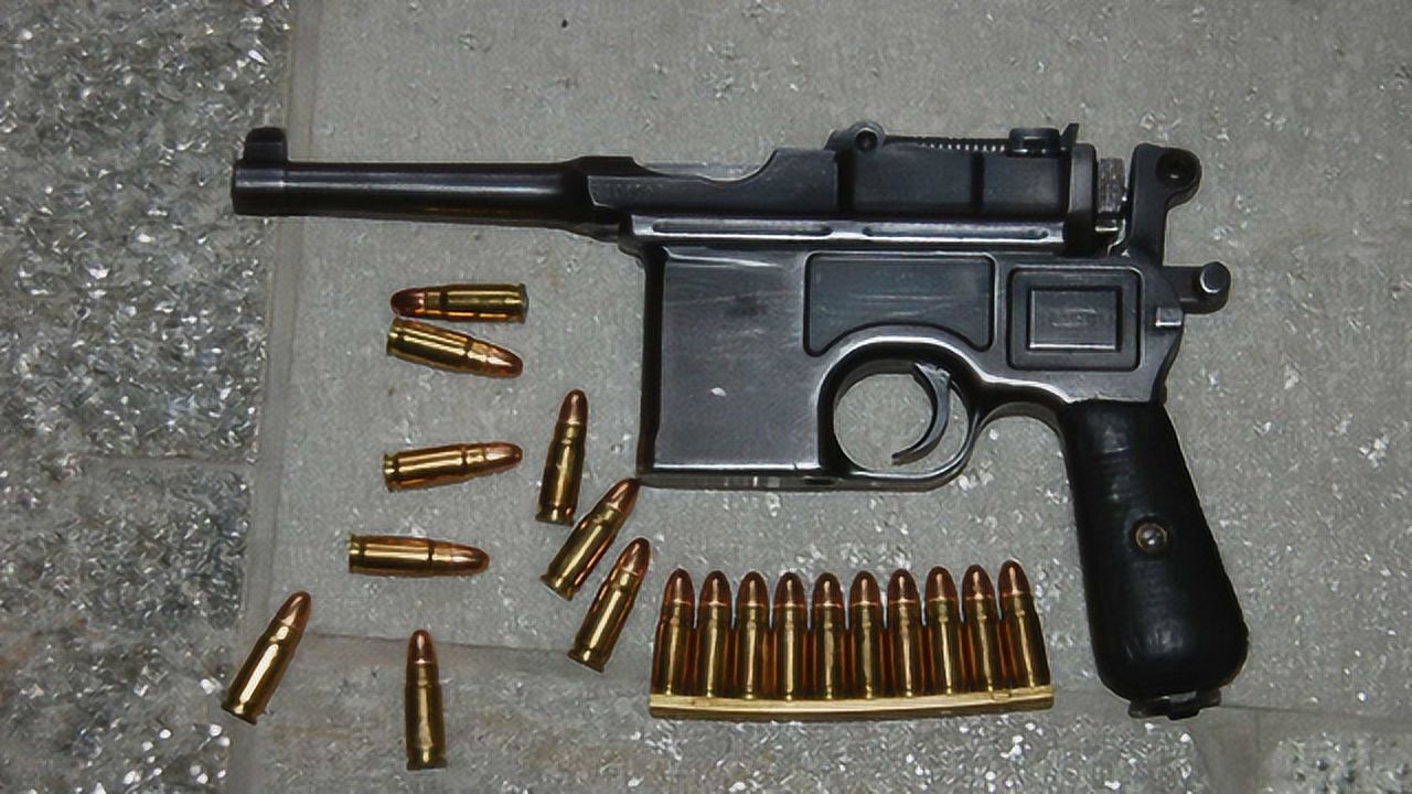 抗日英雄手中的神器德国毛瑟军用驳壳枪中国人称盒子炮