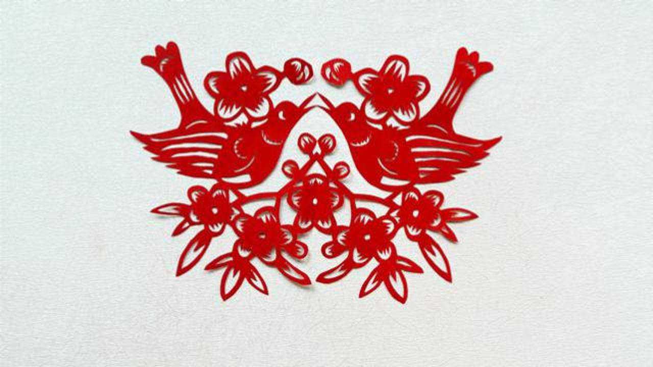 喜鹊登梅剪纸,喜鹊登梅是中国传统吉祥图案,是好运与福气的象征