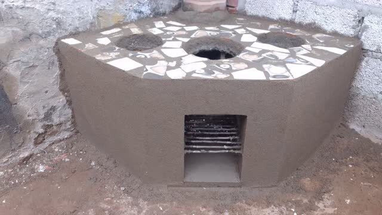 用砖块和水泥制作三个炉口的灶台使用起来效果非常不错很好用