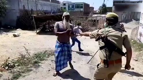 印度警察执法，不戴口罩者棍棒相加，小伙边跑边求饶！