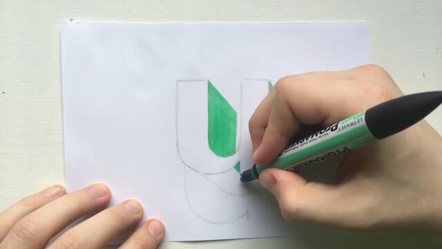 用铅笔和马克笔绘制3D字母U