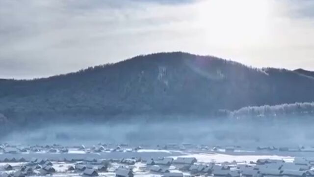 新疆阿勒泰禾木村:古朴木屋封冰雪,宛如童话世界