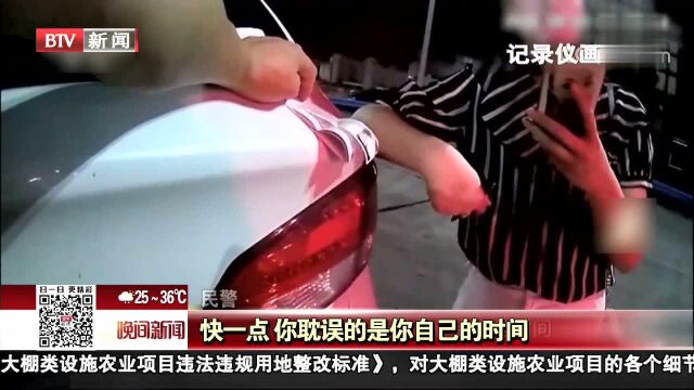 新闻万象ⷮŠ法网恢恢 湖北 女子酒驾遇检倒车逃跑 为求情花样百出