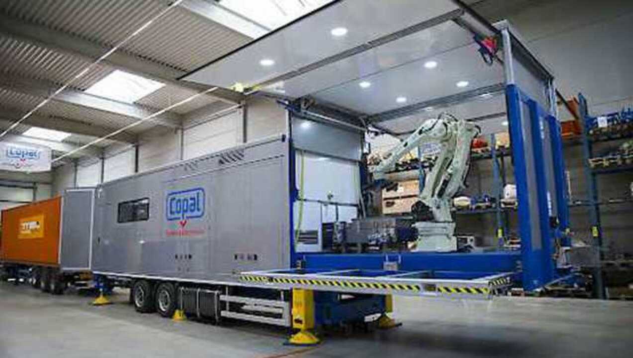 国外发明集装箱自动卸货机太实用难道叉车都要被淘汰了