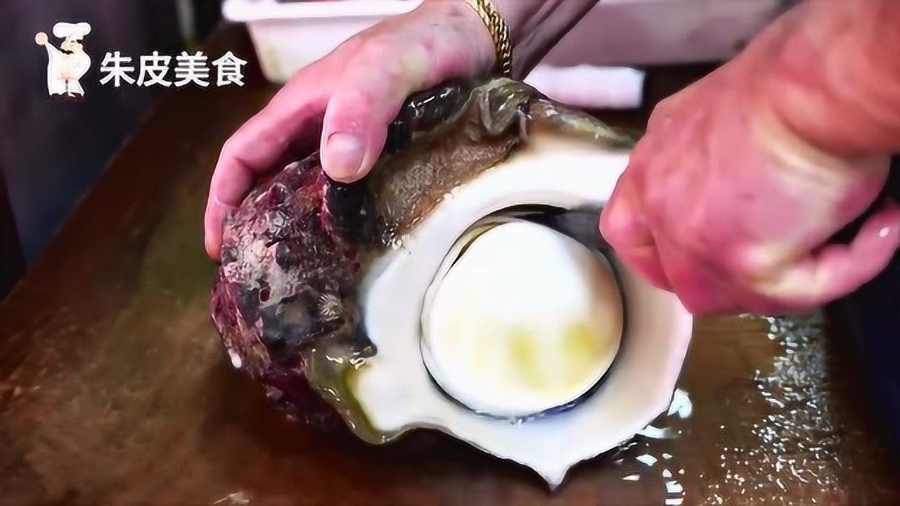 黑乎乎的海蜗牛能吃吗感觉会中毒的样子日本人可真敢吃啊