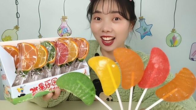 美食拆箱:小姐姐吃“创意橘子片棒棒软糖”,剔透似宝石,好软糯