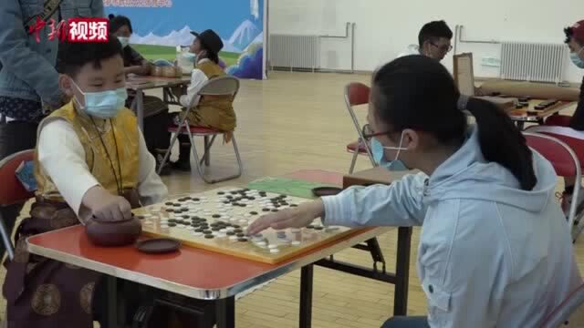 拉萨“雪顿”节:传统藏棋让民众“棋”乐无穷