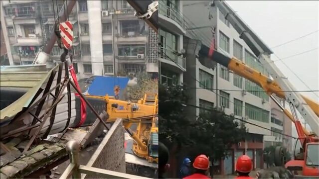 四川达州一吊车失误将吊臂砸屋顶 两吊车赶往救援吊吊车