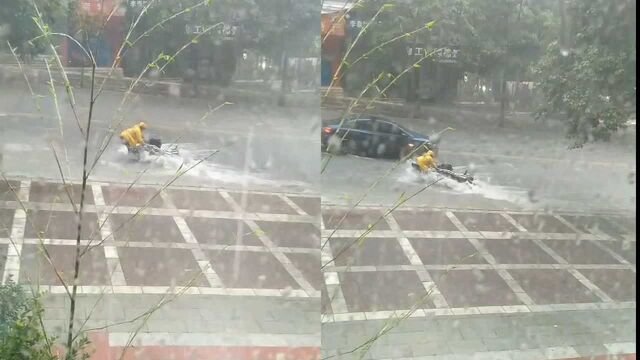 骑手小哥暴雨中抢救电动车看哭网友,所属公司:餐损全额报销