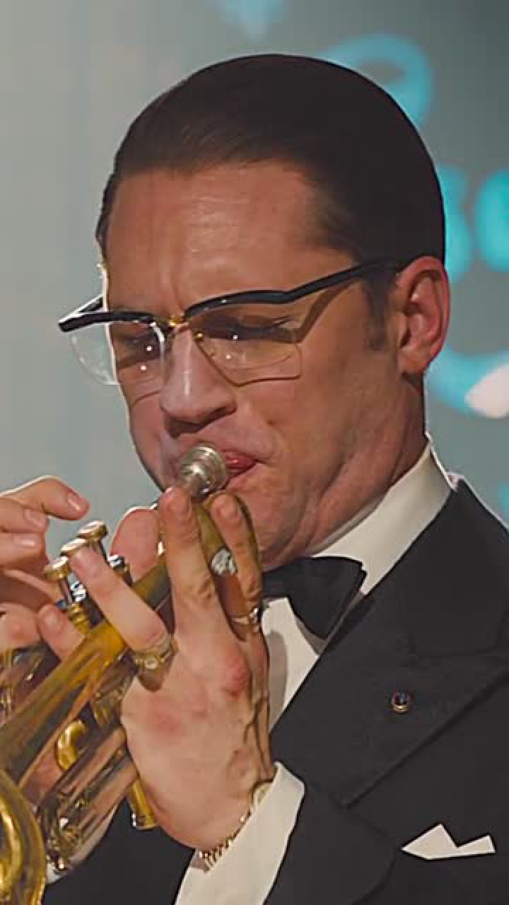 西装暴徒来形容汤老师,你们觉得怎么样呢?