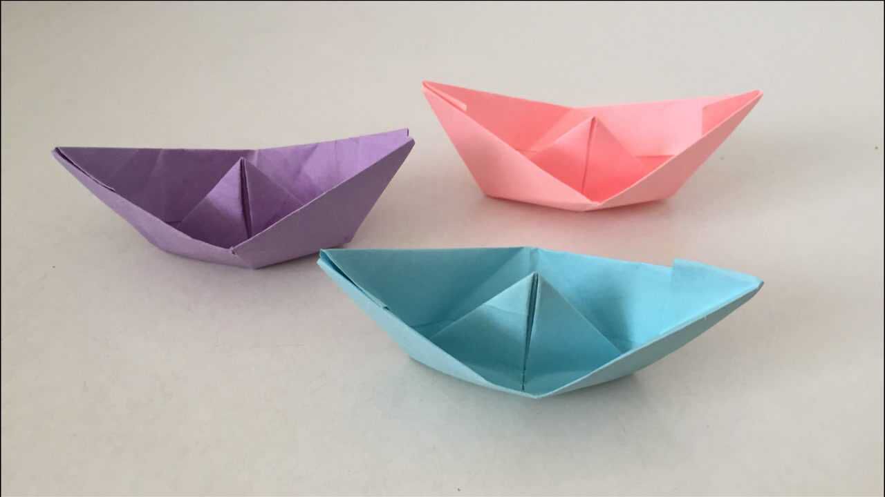 小时候经常玩的小船折法简单还可以在水中游