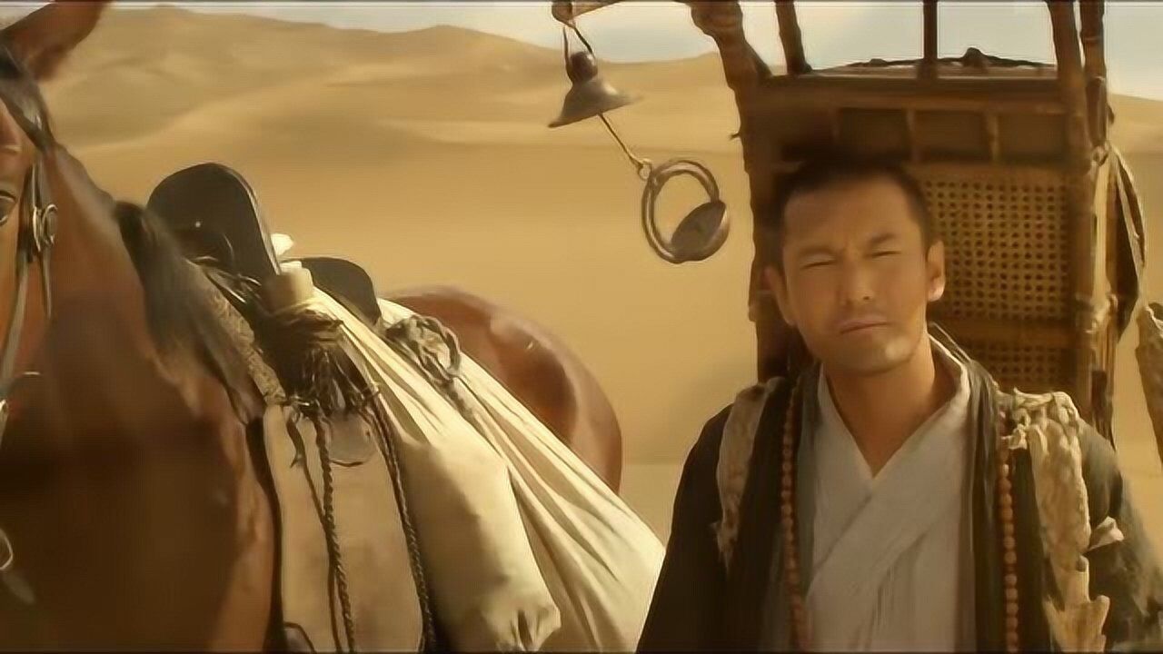 大唐玄奘玄奘牵着马继续前行茫茫沙漠中也独独就他一人