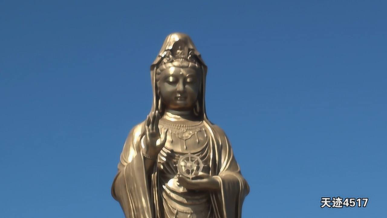 普陀山南海观音塑像通高33米由铜铸成面部13斤黄金
