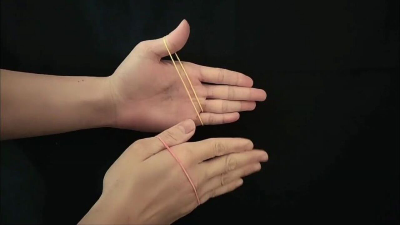 魔术教学:用一根橡皮筋穿越手掌,简单易学!