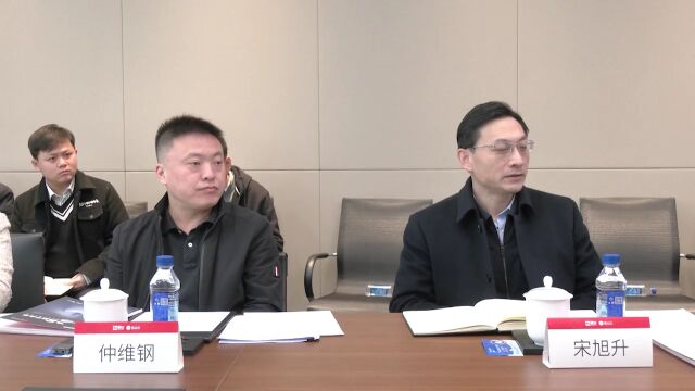 胡忠雄在北京与金山云首席执行官邹涛座谈