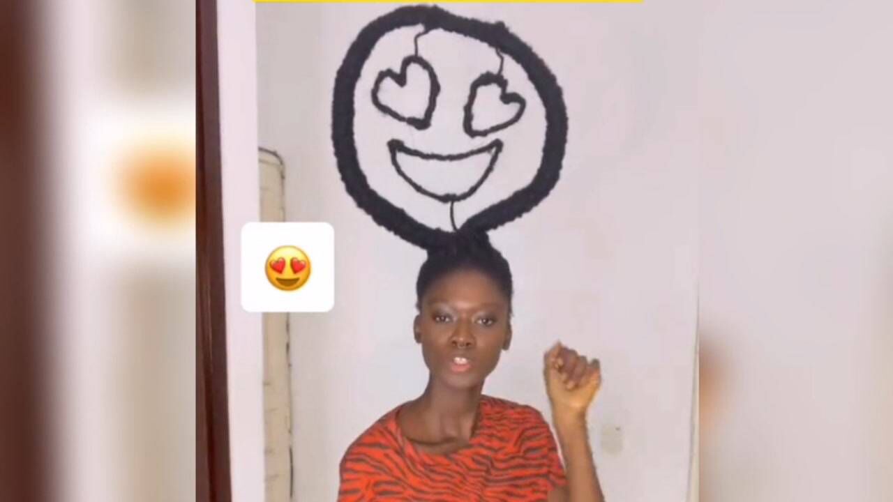 黑人女子用头发编出emoji表情,发量让人羡慕