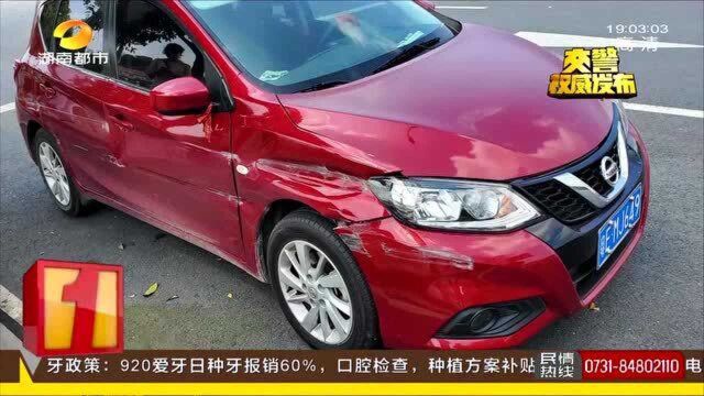 驾车时擦眼睛 车辆失控两度撞击护栏 驾驶员操作不当负全责