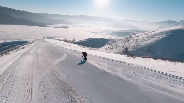 新疆禾木野雪速降 体验风一般的感觉