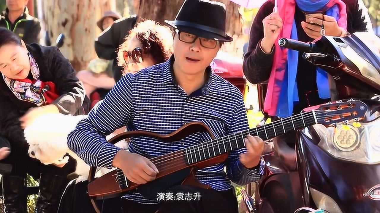 电影追捕插曲杜丘之歌吉他弹奏琴声再现经典音乐