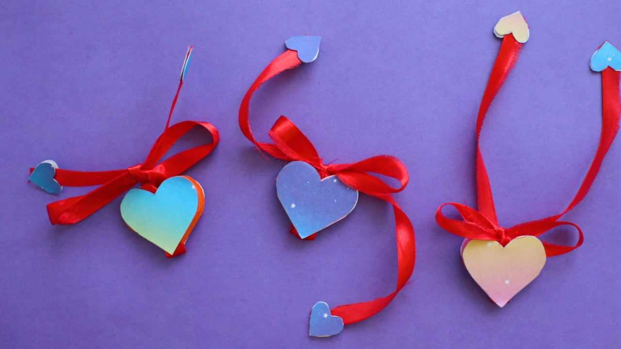 外表是心形折纸,丝带打开后,层层叠叠的很漂亮,步骤也很简单