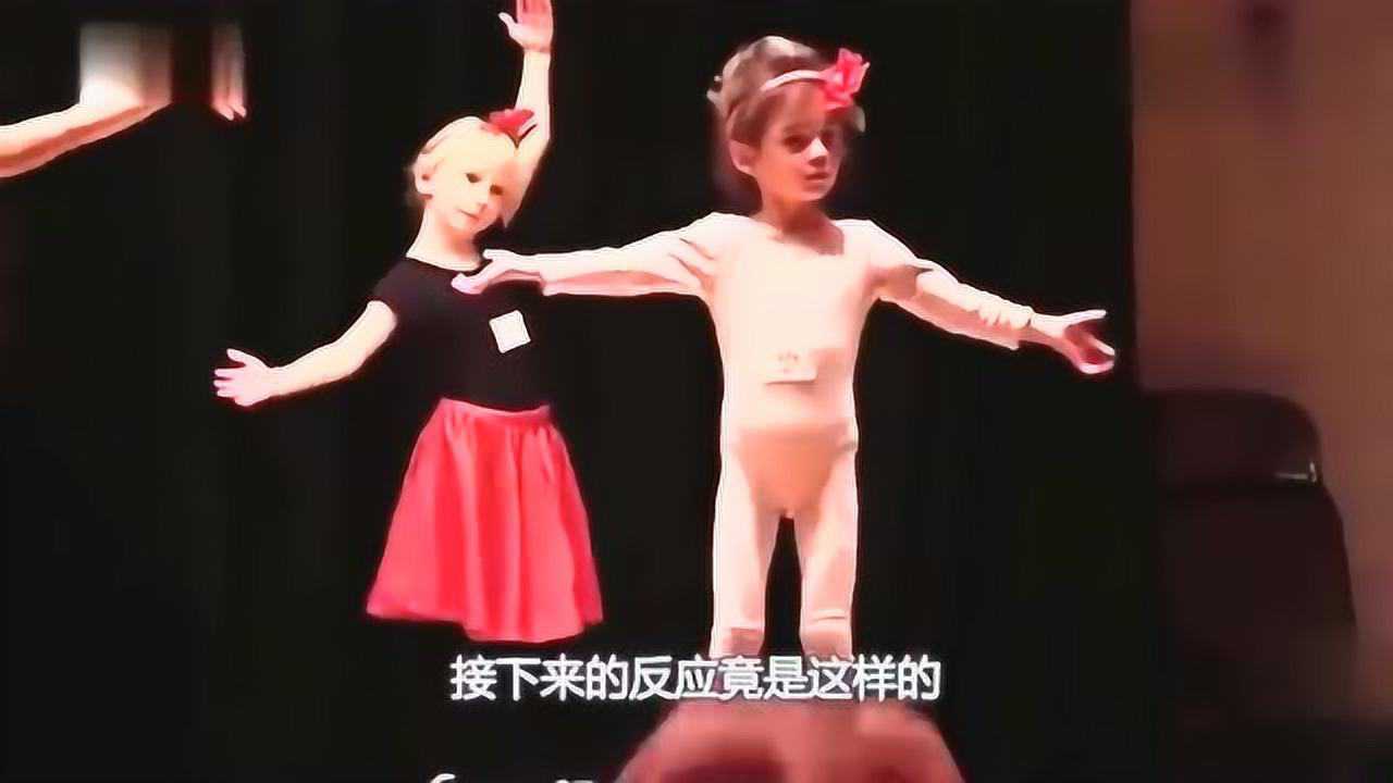 俄罗斯舞蹈跳到一半裙子掉了小女孩挥手化解尴尬观众都被萌化了