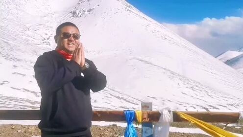 这里是可以净化心灵的天上西藏！这里是海拔5190米的那根拉山口。向神山献上我的哈达，献上我的吉祥如意：扎西德勒！