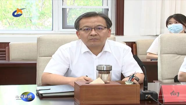 康彦民与中国二十二冶集团董事长、党委书记袁斯浪举行座谈