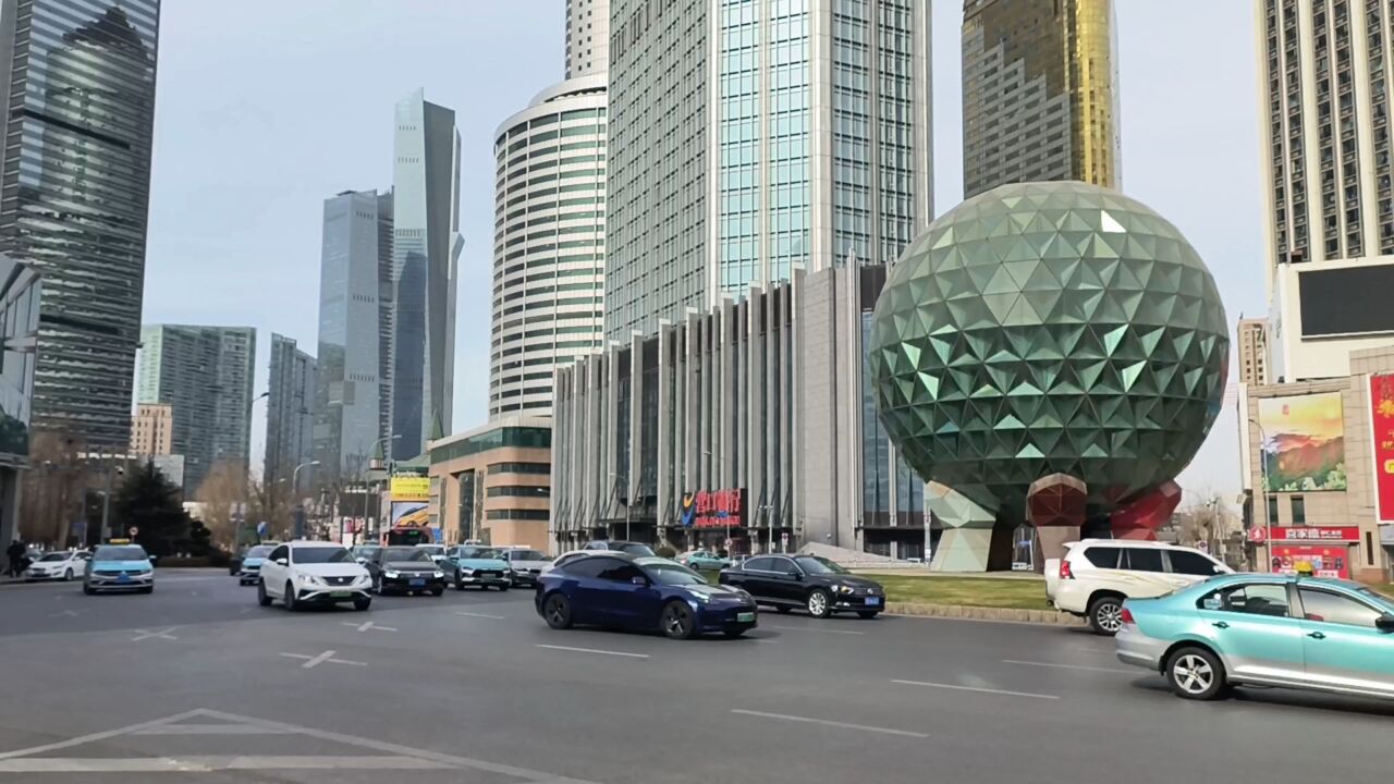 大连地标建筑水晶球,是什么寓意呀,友好广场北方明珠